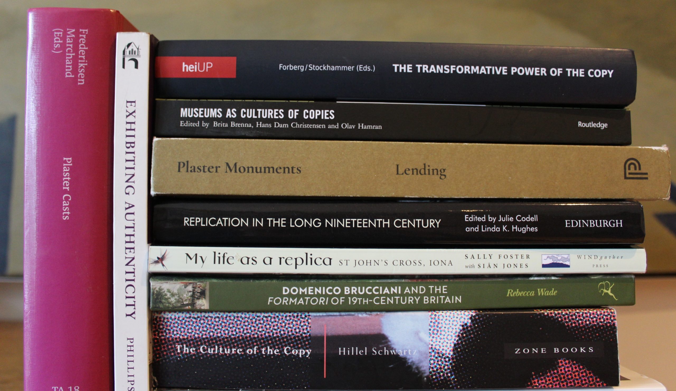 A stack of books with titles relating to replicas (c) Sally Foster